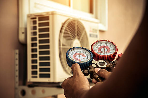 Professional Emergency Hvac technician working in Westwood, MA